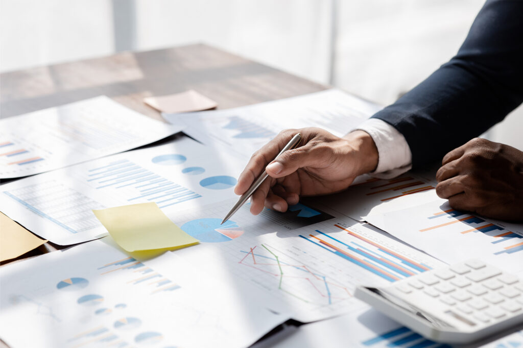 A male professional working on a report